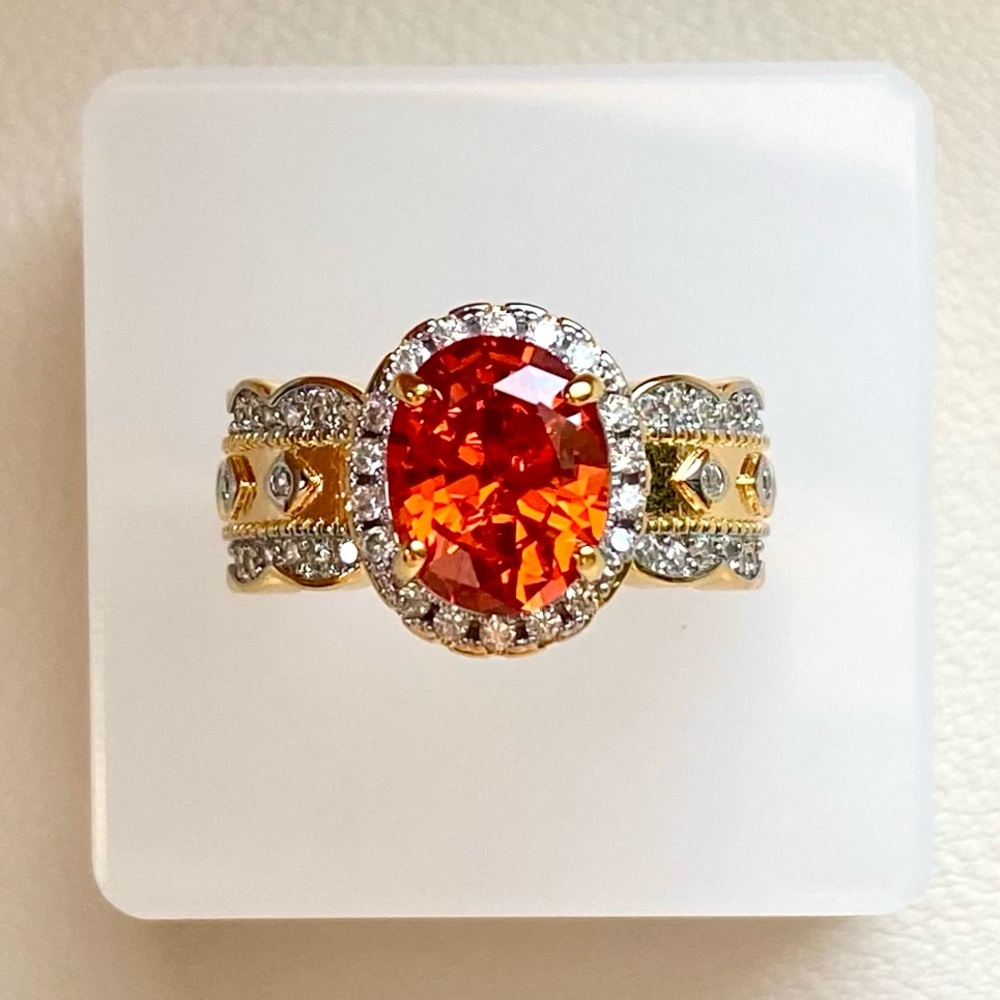 Gold Band Ring with Orange Center Stone